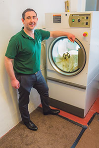 Huebsch dryers help achieve massive savings